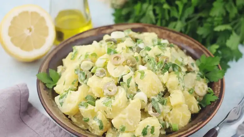 Make Potato Salad Italian Deli-Worthy By Adding A Jar Of This Flavor-Packed Ingredient