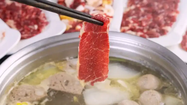 How long should the beef be cooked for hot pot?