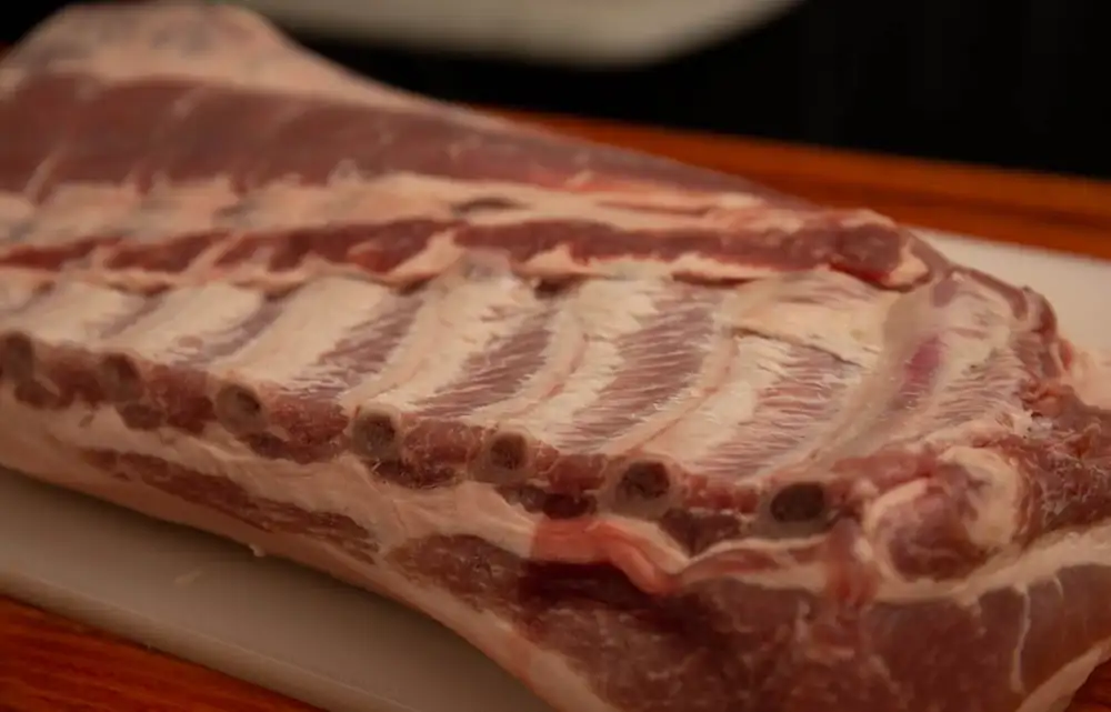 How many ribs are in a rack of pork, beef, or lamb?