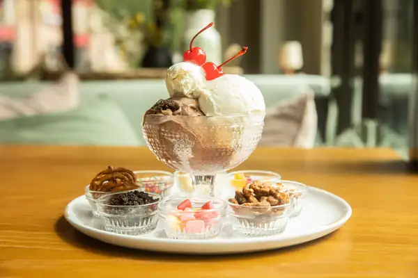 Evelyn’s Opens its Doors With Steak Tartare and Towering Sundaes