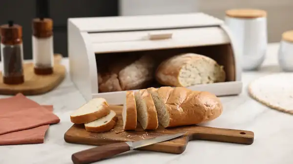 Everyone with a bread box is encouraged to place this fruit inside to prevent the baguette from drying out