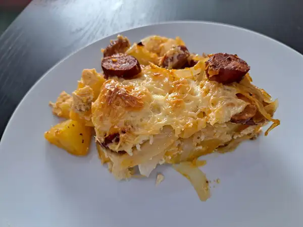 Baked potatoes with sausage and cheese