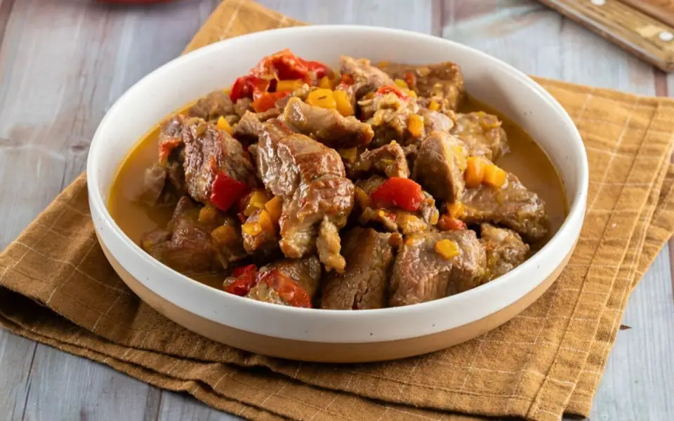 Greek-Style Braised Pork with Orange, Honey, and Peppers