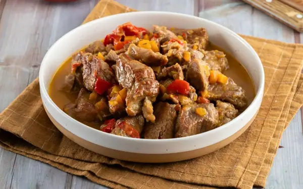 Greek-Style Braised Pork with Orange, Honey, and Peppers