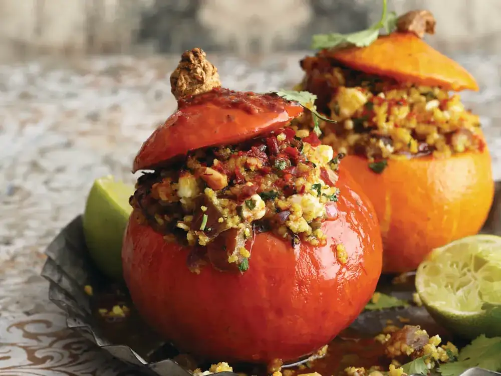 Braised pumpkin with couscous and feta cheese filling
