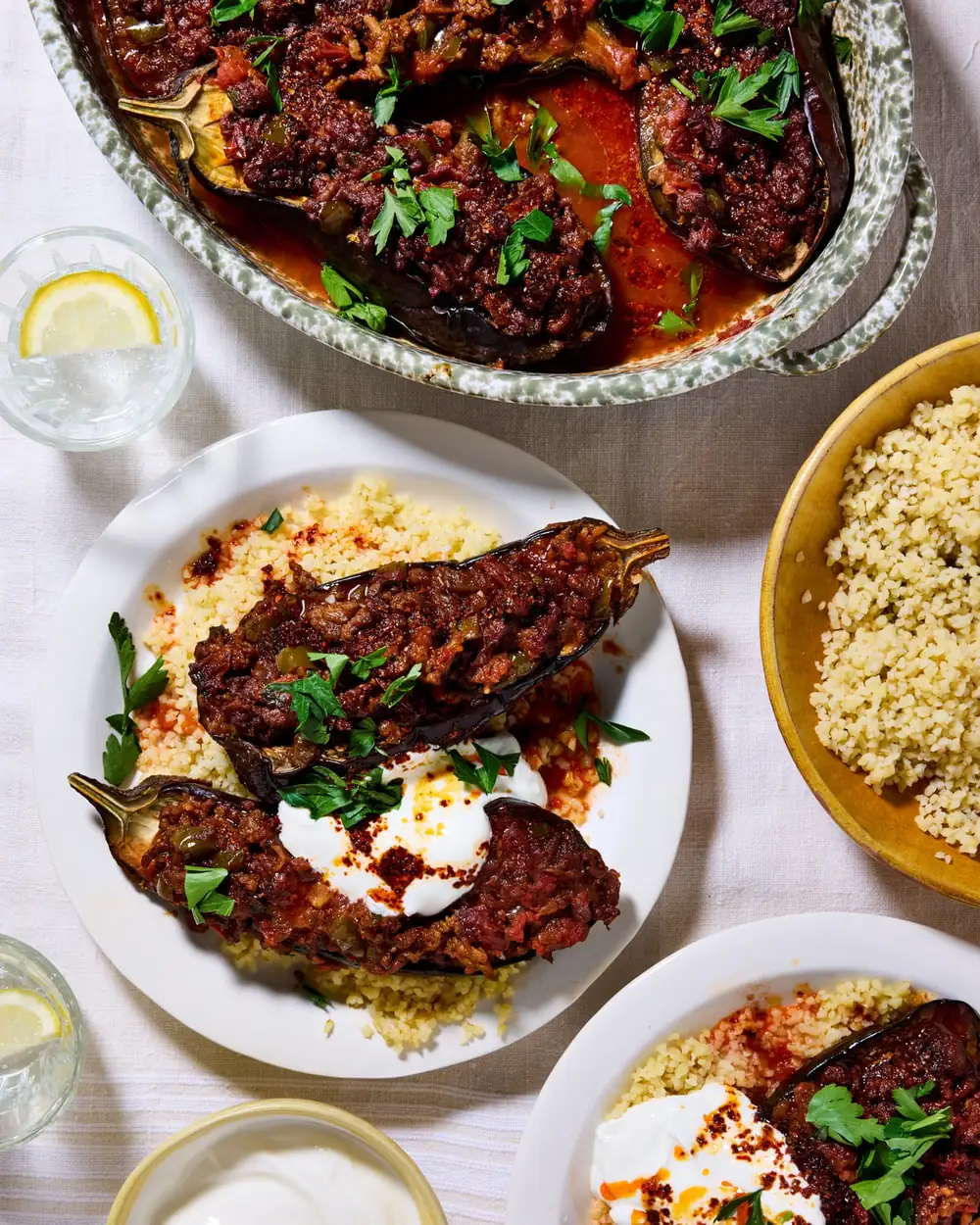 Thomasina Miers’ recipes for spiced lamb-stuffed aubergine with aleppo chilli butter, and berry ripple ice-cream