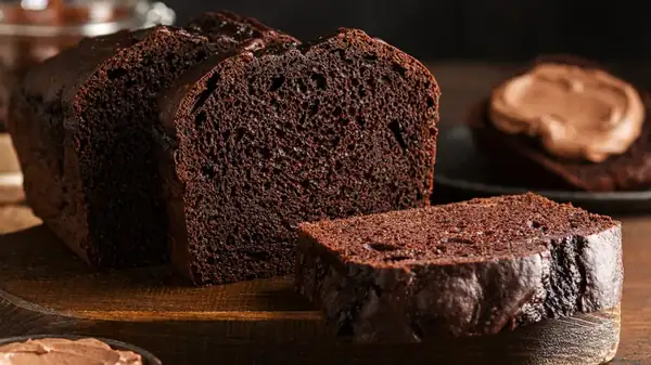 Hot water instead of milk to enhance the flavor of the chocolate cake