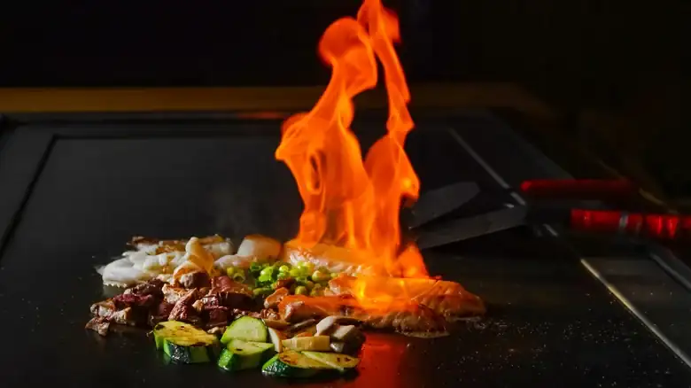 The difference between teriyaki and hibachi lies in the heat and the sauce.