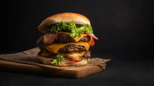This Mixing Mistake That's Making Your Burgers Chewy