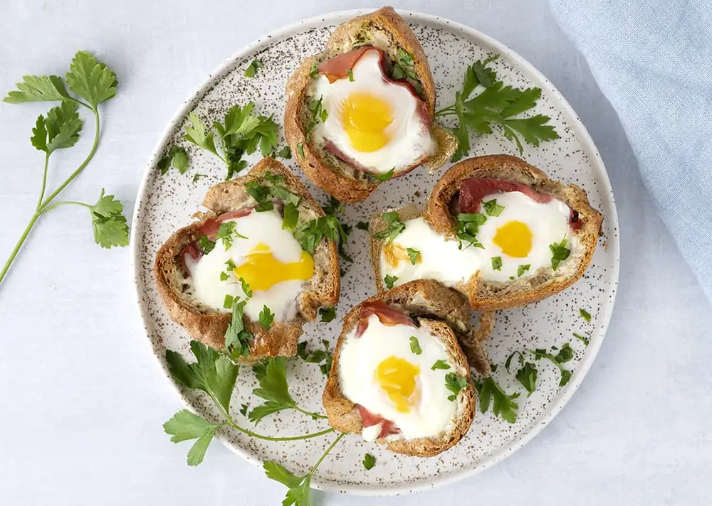 Bread bowl with ham and egg