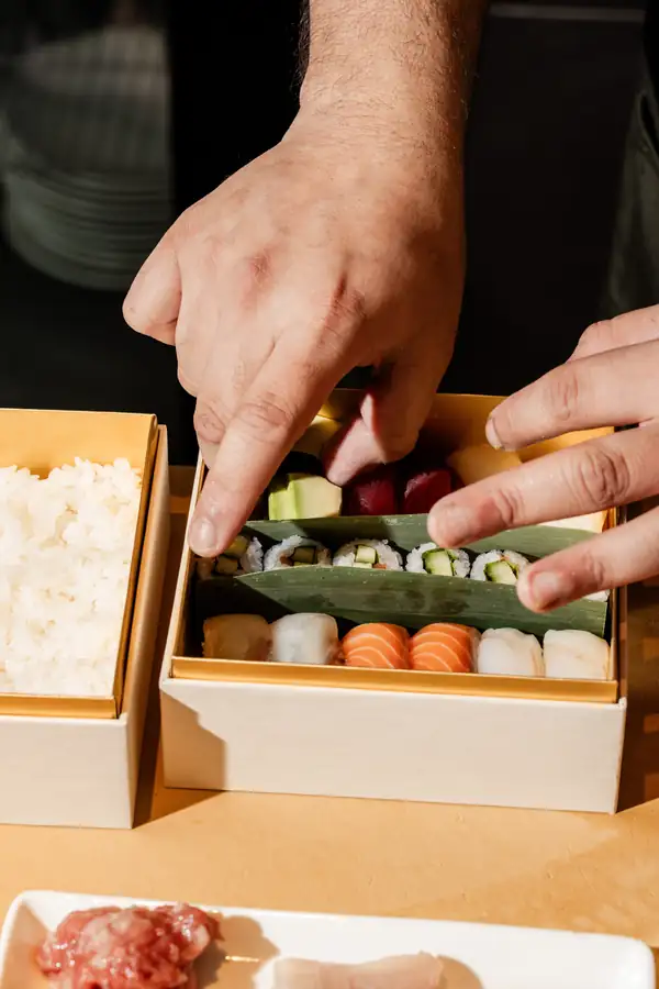 Uchi, Uchiba, and Uchiko Will Now Uber Eats You a Silk Box of Sushi