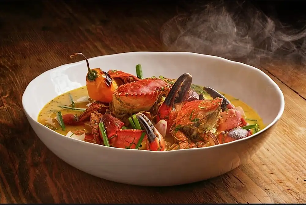 Stewed grouper and stone crab. Héctor Solís at Fiesta