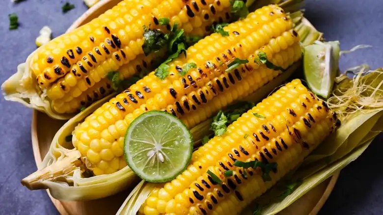 The tastiest corn on the cob is grilled with the husk on.