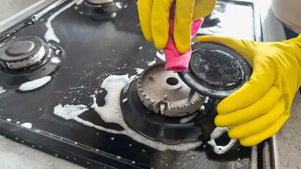 If You Avoid Cleaning This Part Of Your Gas Stove You'll Pay For It Later