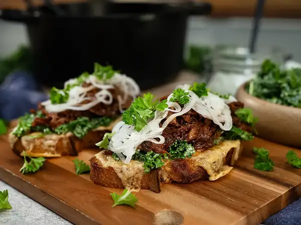 Sourdough toast with pulled beef and green coleslaw