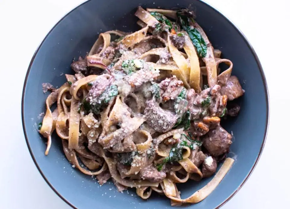 Mushroom Tagliatelle with Walnuts & Green Leaves