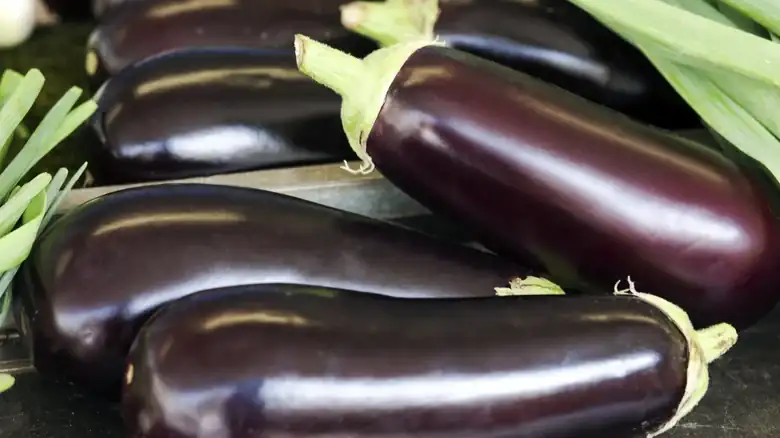 When You Should Peel Eggplants For Your Dishes