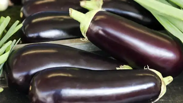 When You Should Peel Eggplants For Your Dishes