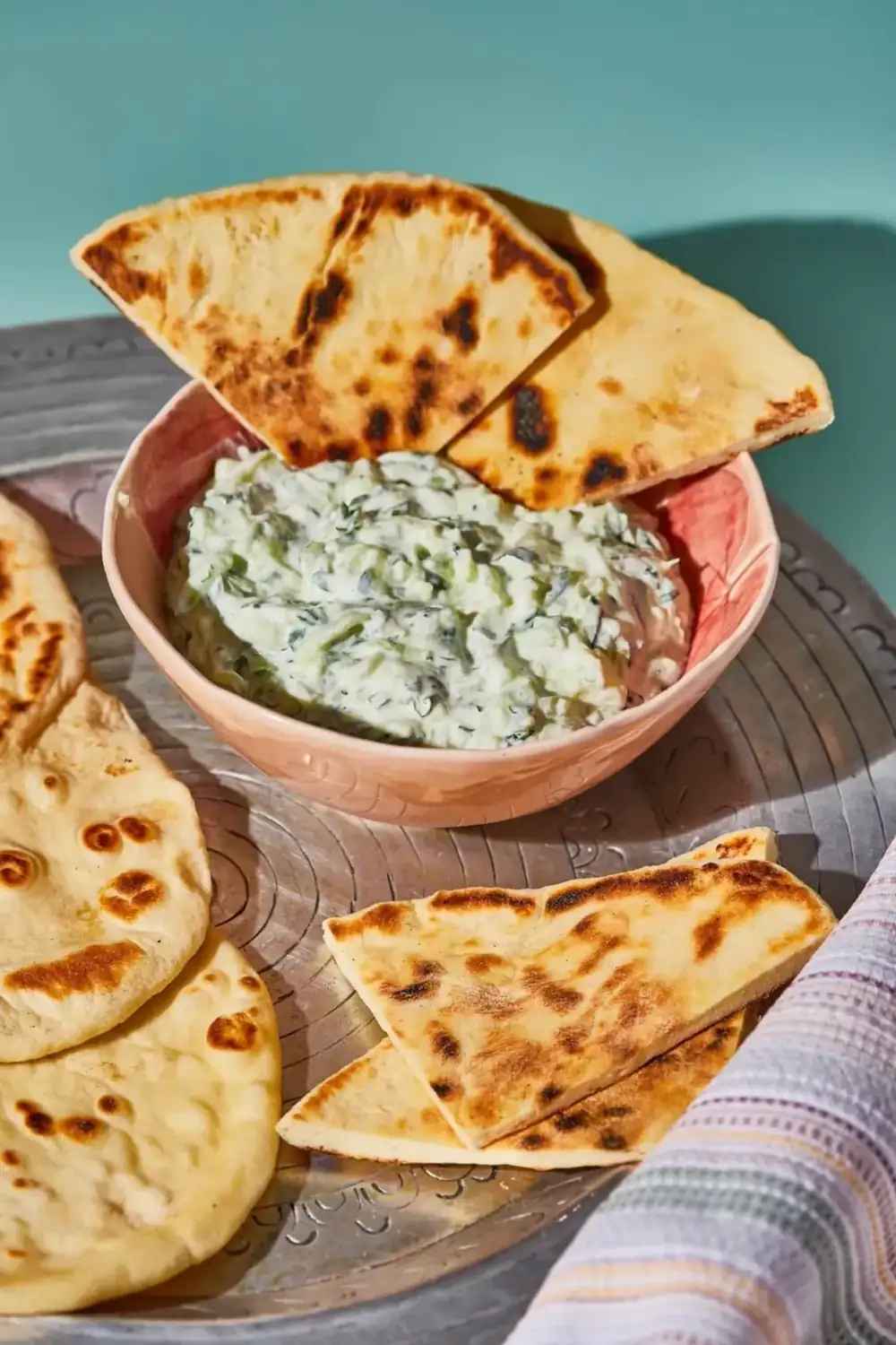 Wild garlic tzatziki with naan bread