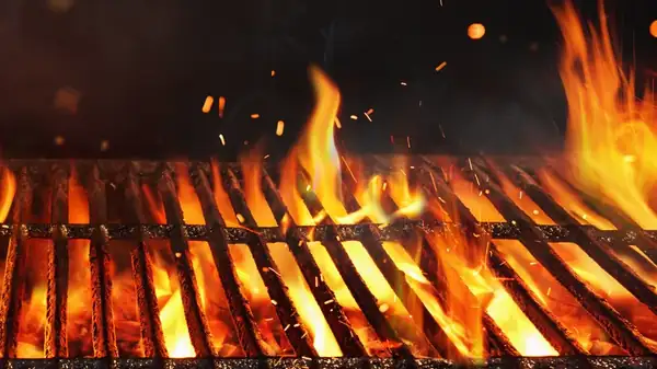 Before You Start Scrubbing Your Grill Grates, Clean Them With Heat