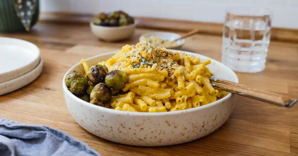 Vegan pumpkin mac 'n' cheese with roasted Brussels sprouts