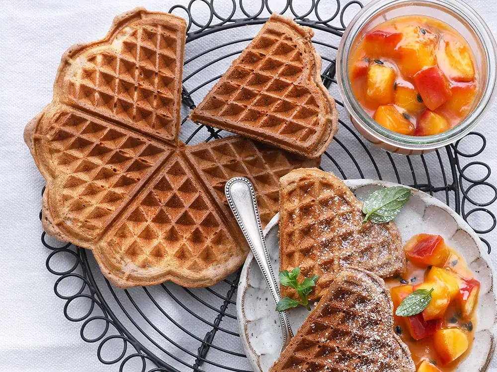 Waffles with nectarine and passion fruit compote