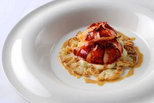 Poached Lobster Tail w/ Cauliflower and Lobster Butter Sauce