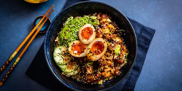 Korean rice bowls with mayak eggs, soy-glazed chicken and avocado