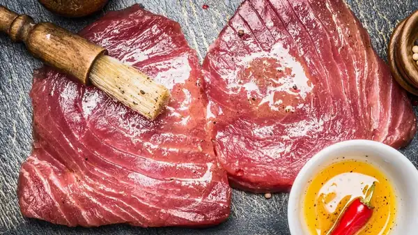The sugar in the marinade of a restaurant-quality tuna steak