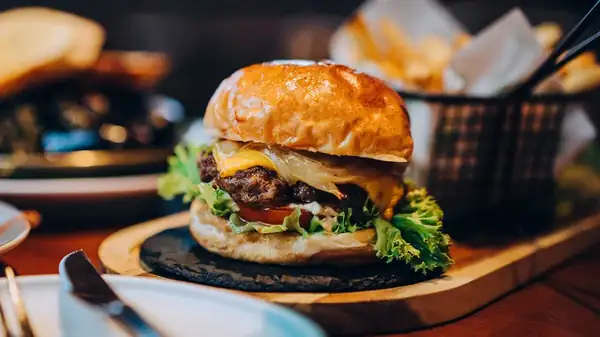 Make Your Hamburger Luxuriously Creamy With A Simple Cheese Swap