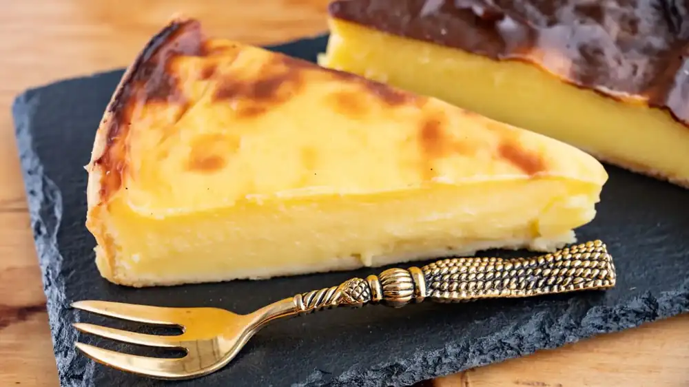 The pastry chef at the Hôtel de Crillon does not let the cream cool before baking the flan.