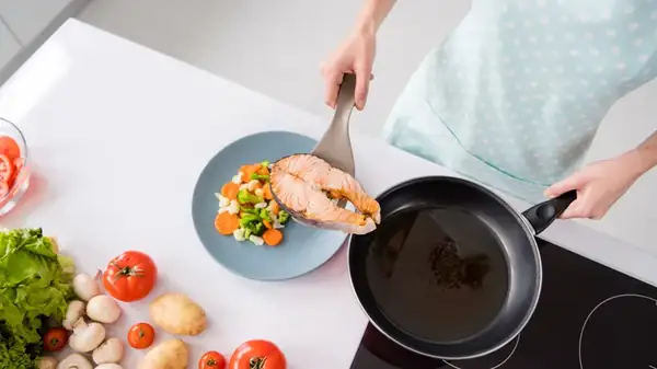 Why You Don't Have To Worry About Using Too Much Fat When Cooking Salmon