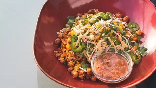 Elevate your everyday meal with this loaded mixed dal burrito bowl recipe served with creamy dahi dip and paneer