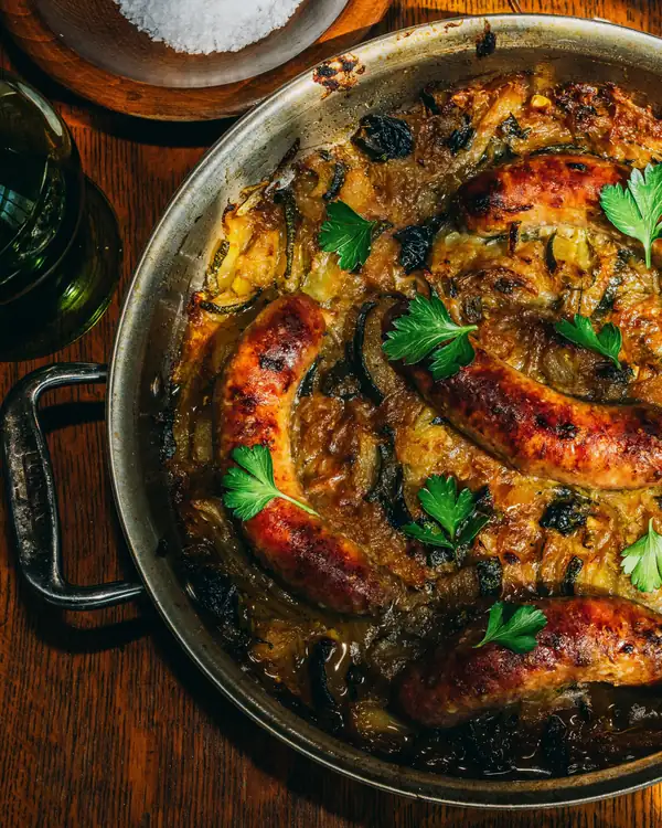 Roasted Sausages With Cider-Braised Onions and Zucchini Recipe