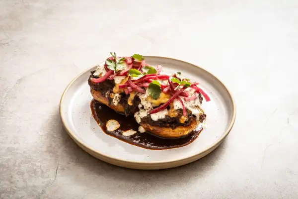 Beef Birria-Loaded Jacket Potatoes With Lime Crema Recipe
