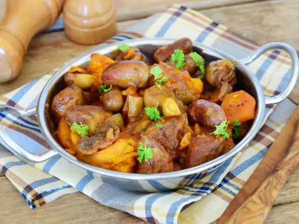 Chicken hearts baked in a sleeve in the oven