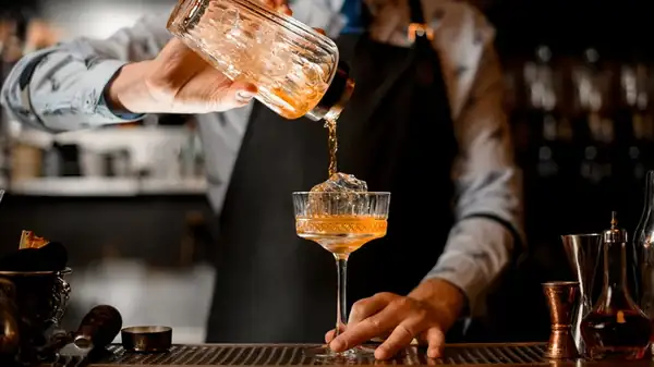 The Expensive Cocktail You Should Always Avoid Ordering At The Bar