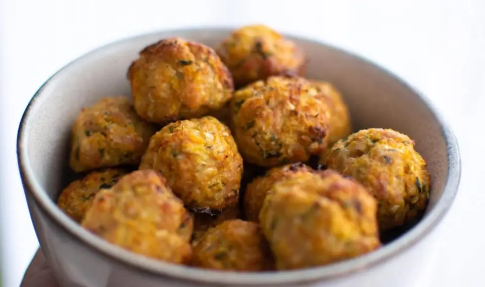 Baked Chicken Meatballs with Veggies & Yogurt Sauce