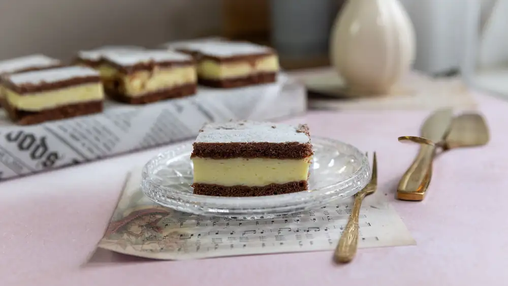 The custard dessert has a luxurious feel thanks to its layers. It is decorated with alternating dark and light