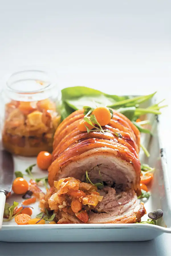 Rolled pork belly with gooseberry and almond chutney