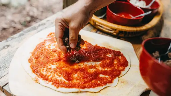 The Risk You Might Be Taking With Homemade Pizza Toppings