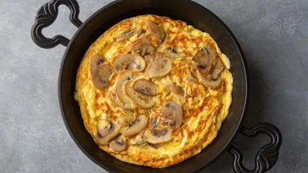 Top French chefs agree: “An omelet tastes better when the mushrooms are cooked separately; it prevents everything from getting soggy.”