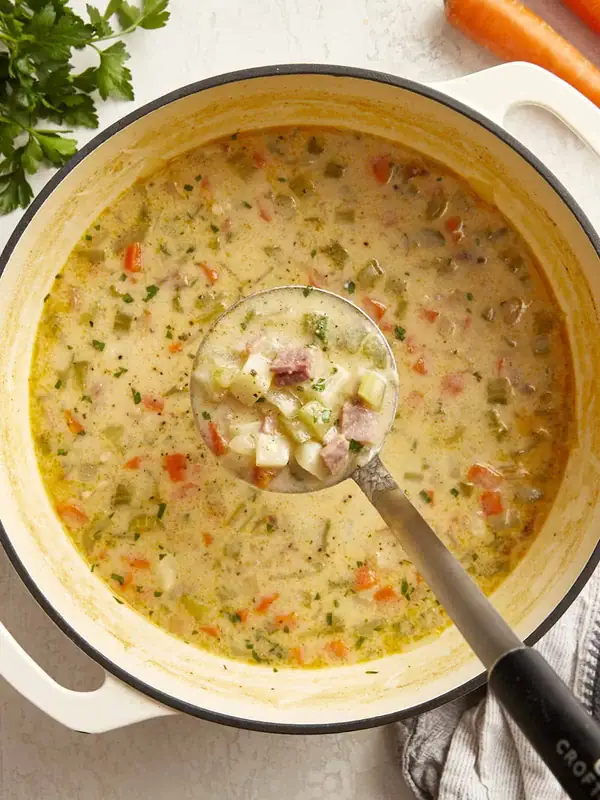 Veggie-packed ham soup perfect for cozy, in-between seasons!