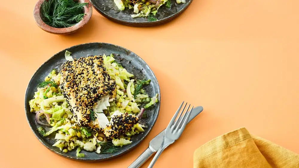 Healthy meets delicious: Pollock in a sesame crust on savoy cabbage and lentil vegetables