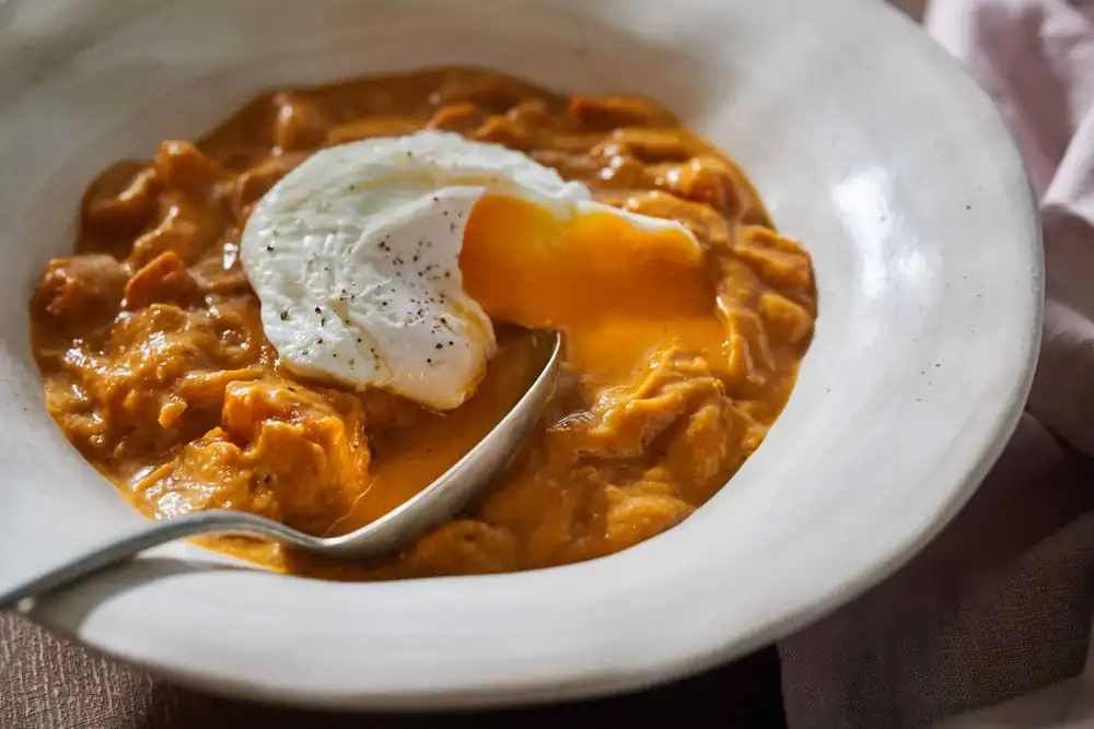 Flourless pumpkin stew with poached eggs recipe
