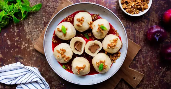 Vegan nougat dumplings with plum sauce