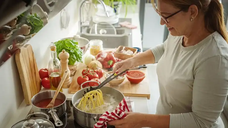 The Imperative Step To Take Immediately After Adding Pasta To Boiling Water