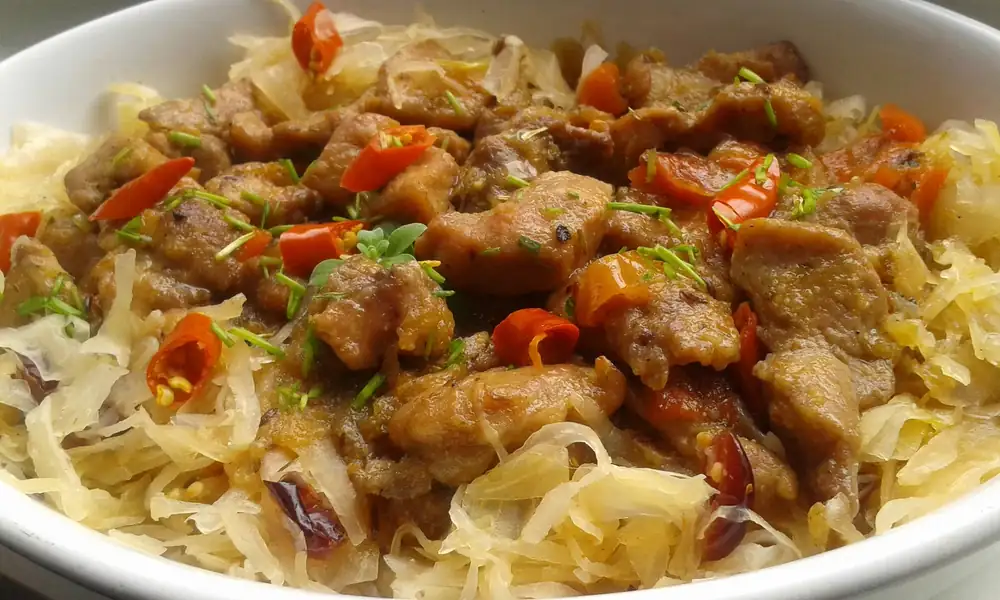 Pork neck cubes in sauerkraut