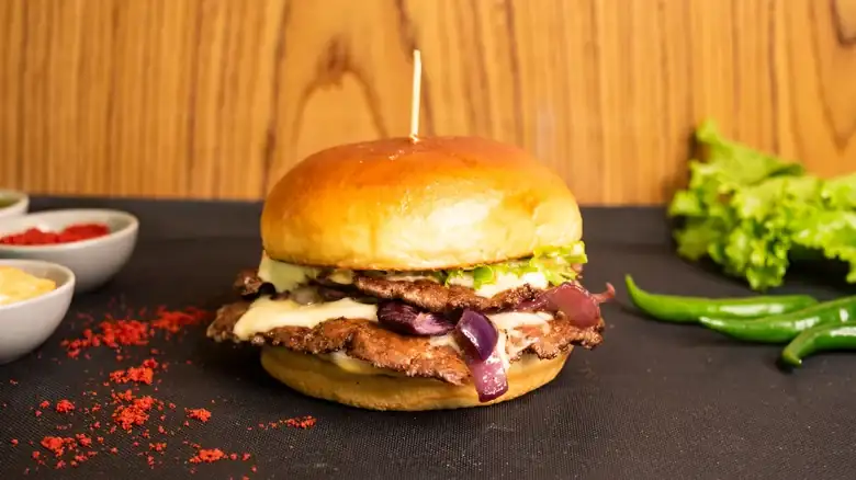 Flattening the meat gives turkey burgers much more flavor.
