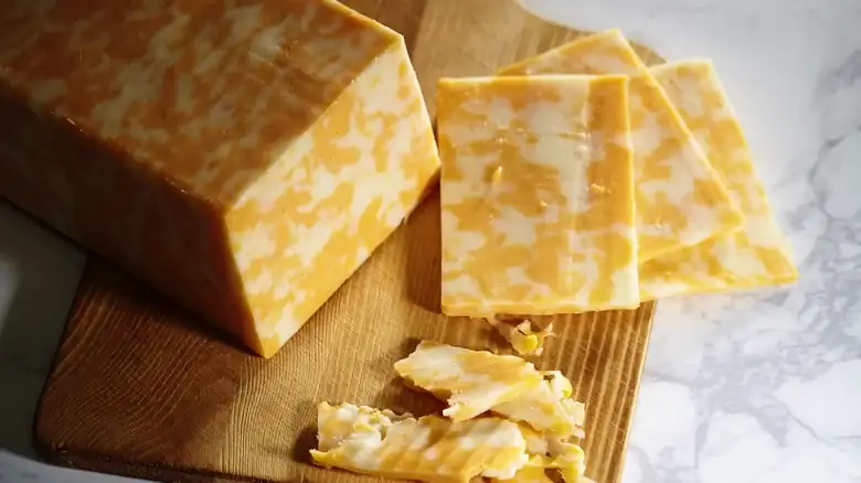 The Small Difference Between Colby Cheese And Cheddar Cheese